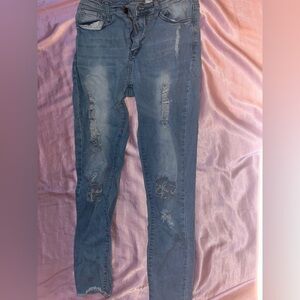 Women's Distressed Blue Jeans